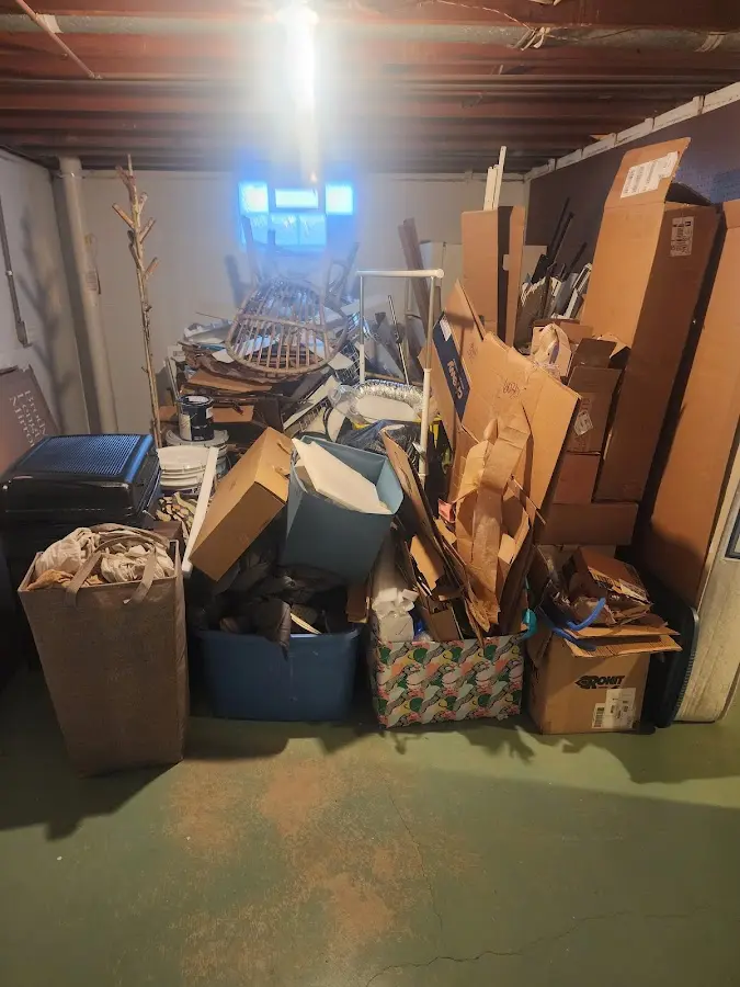 Roll-off dumpster container at job site for Yard Waste Dumpster Rental in Radford